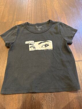 Brandy Melville Black Tee with Cream Eye Graphic